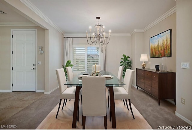 2559 Deora Way, Henderson, NV 89052 - dining room featuring light colored carpet, a chandelier, and ornamental molding