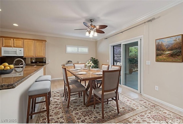 2559 Deora Way, Henderson, NV 89052 - dining room with a ceiling fan, crown molding, recessed lighting, and light wood finished floors