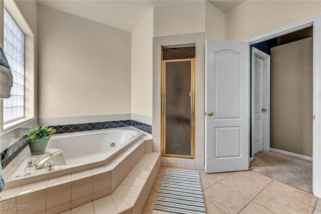 1971 Del Font Ct, Las Vegas, NV 89117 - bathroom with a stall shower, a whirlpool tub, and tile patterned floors