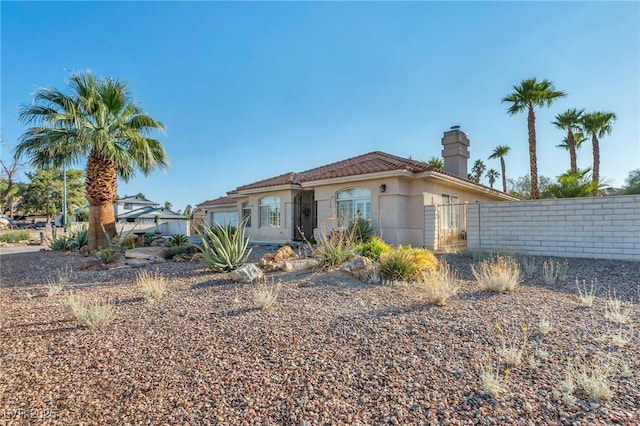 1971 Del Font Ct, Las Vegas, NV 89117 - view of front of property with a chimney, stucco siding, and a tiled roof