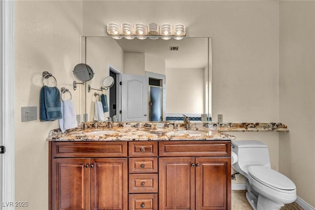 1971 Del Font Ct, Las Vegas, NV 89117 - full bathroom featuring double vanity and toilet