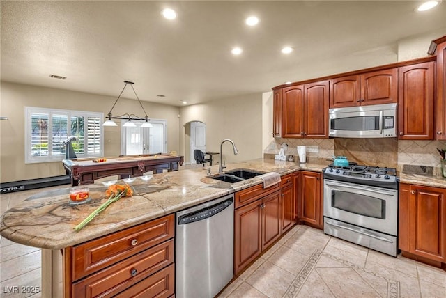 1971 Del Font Ct, Las Vegas, NV 89117 - kitchen featuring stainless steel appliances, a peninsula, tasteful backsplash, recessed lighting, and light tile patterned floors