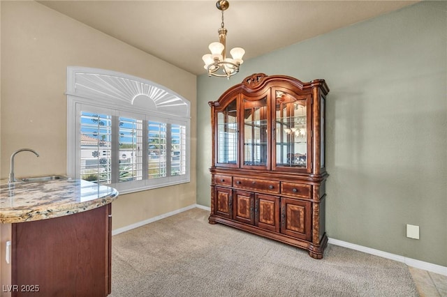1971 Del Font Ct, Las Vegas, NV 89117 - dining space with a chandelier and light carpet