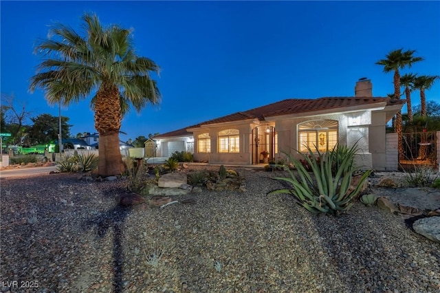 1971 Del Font Ct, Las Vegas, NV 89117 - mediterranean / spanish-style house with a chimney and stucco siding