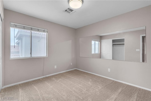 5001 Pounding Surf Ave, Las Vegas, NV 89131 - unfurnished room featuring baseboards and carpet floors