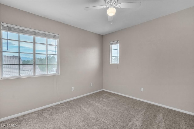 5001 Pounding Surf Ave, Las Vegas, NV 89131 - carpeted spare room featuring baseboards and ceiling fan