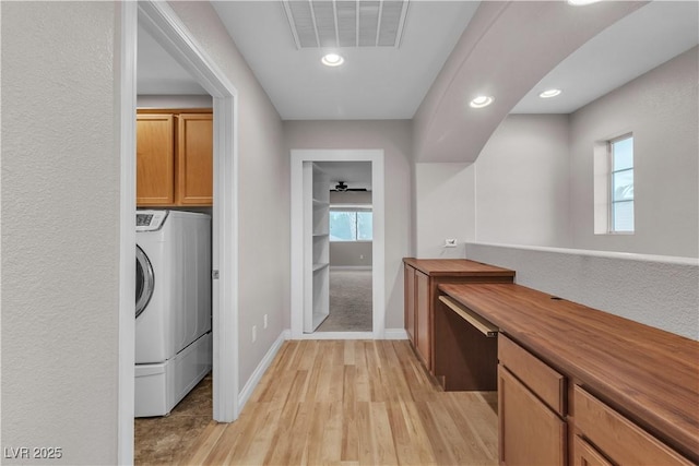 5001 Pounding Surf Ave, Las Vegas, NV 89131 - washroom featuring washer / dryer, light wood-type flooring, cabinet space, and recessed lighting