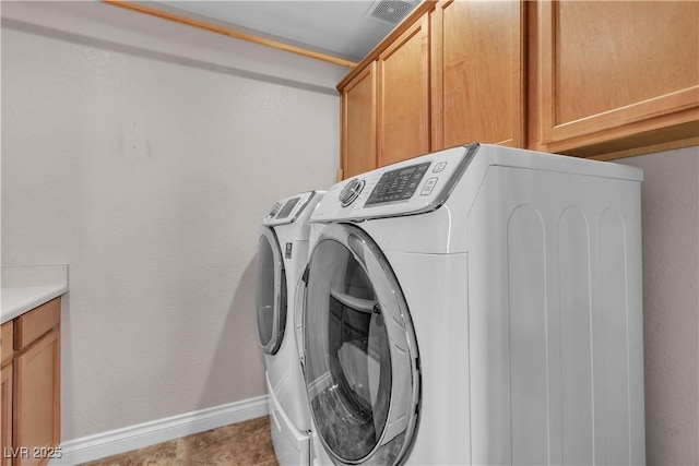 5001 Pounding Surf Ave, Las Vegas, NV 89131 - washroom featuring cabinet space and washing machine and dryer