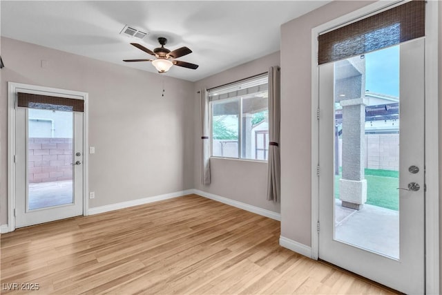 5001 Pounding Surf Ave, Las Vegas, NV 89131 - entryway featuring plenty of natural light, light wood-style floors, and a ceiling fan