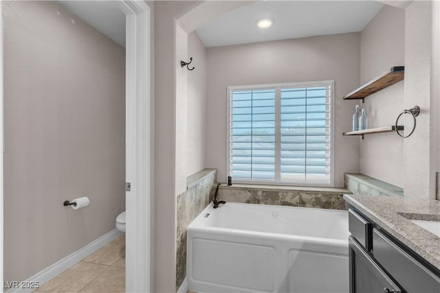 5001 Pounding Surf Ave, Las Vegas, NV 89131 - bathroom with a garden tub, tile patterned flooring, and vanity