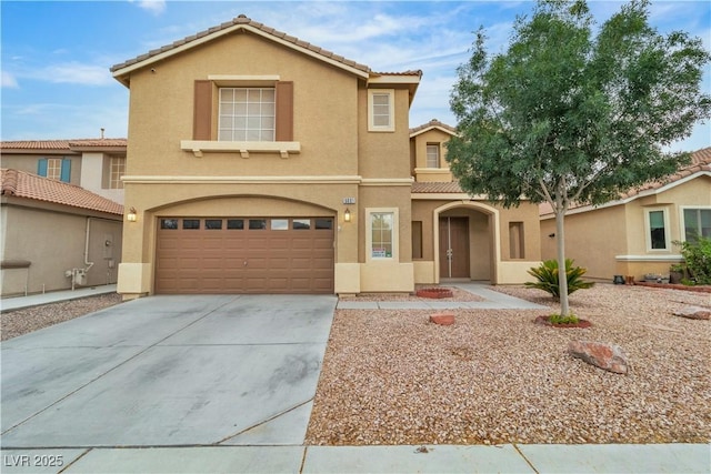 5001 Pounding Surf Ave, Las Vegas, NV 89131 - view of front facade featuring a garage, a tile roof, driveway, and stucco siding