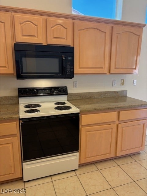 3013 Abercorn Dr, Las Vegas, NV 89134 - kitchen featuring black microwave, electric stove, light brown cabinets, and light tile patterned floors