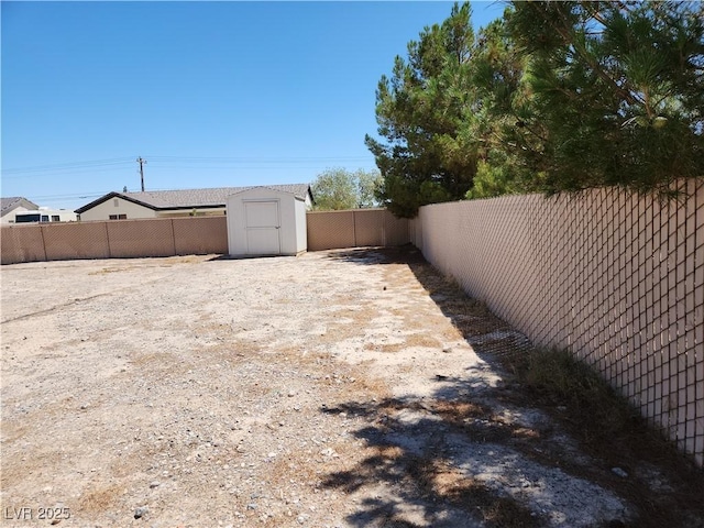 161 Diamond Bar Rd, Pahrump, NV 89048 - fenced backyard with a storage unit