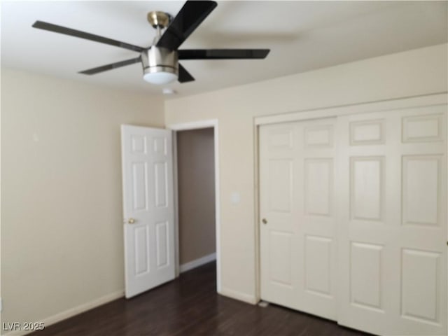 161 Diamond Bar Rd, Pahrump, NV 89048 - unfurnished bedroom featuring dark wood-style flooring, a closet, and a ceiling fan