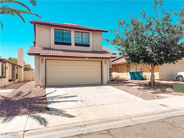 6437 Peachwood Rd, Las Vegas, NV 89108 - view of front of home featuring stucco siding, a tile roof, concrete driveway, and an attached garage