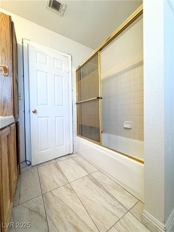 6437 Peachwood Rd, Las Vegas, NV 89108 - bathroom with combined bath / shower with glass door