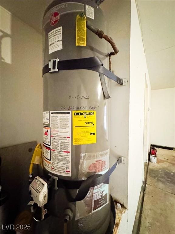 6437 Peachwood Rd, Las Vegas, NV 89108 - utility room featuring strapped water heater