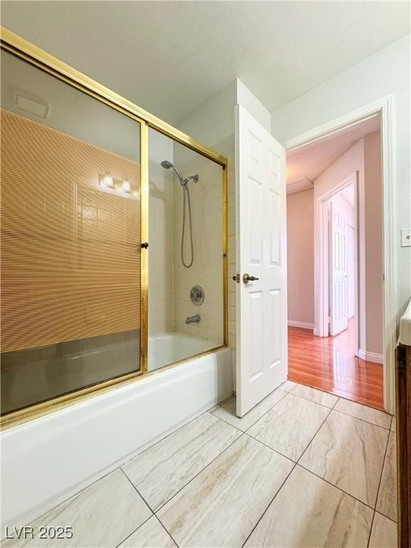 6437 Peachwood Rd, Las Vegas, NV 89108 - bathroom featuring bath / shower combo with glass door and vanity