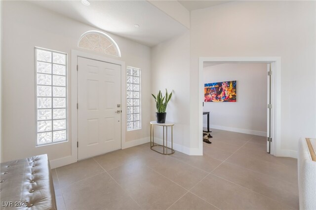 9332 Sienna Vista Dr, Las Vegas, NV 89117 - tiled foyer entrance with plenty of natural light
