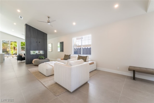9332 Sienna Vista Dr, Las Vegas, NV 89117 - living room featuring lofted ceiling, ceiling fan, recessed lighting, and light tile patterned floors
