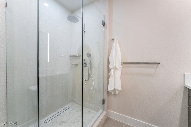 9332 Sienna Vista Dr, Las Vegas, NV 89117 - bathroom with a shower stall, vanity, and tile patterned floors