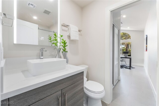 9332 Sienna Vista Dr, Las Vegas, NV 89117 - bathroom with vanity, recessed lighting, and tile patterned flooring