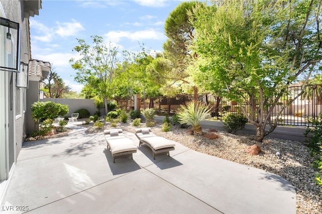 9332 Sienna Vista Dr, Las Vegas, NV 89117 - fenced backyard featuring a patio area