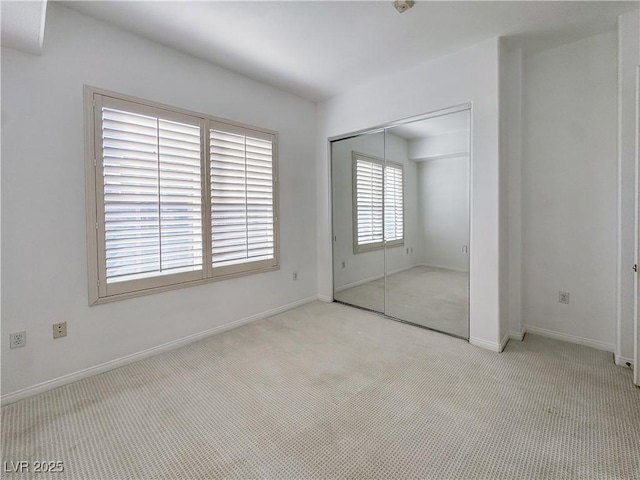 38 E Serene Ave Unit 402, Las Vegas, NV 89123 - unfurnished bedroom featuring carpet floors and a closet