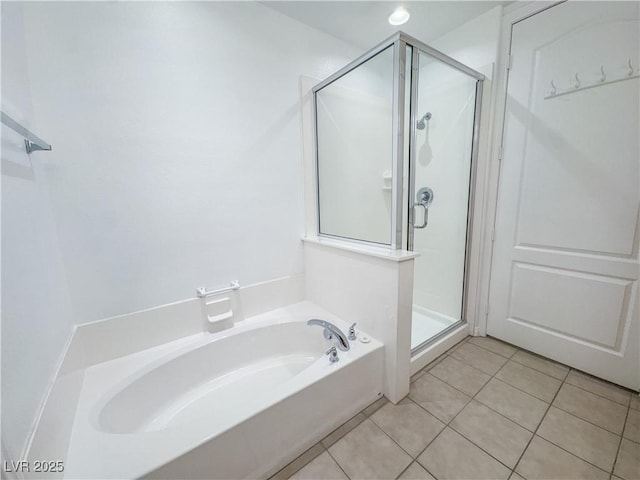 38 E Serene Ave Unit 402, Las Vegas, NV 89123 - full bathroom featuring a shower stall, a bath, and tile patterned floors