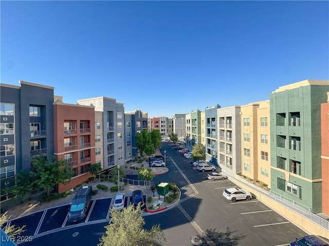 38 E Serene Ave Unit 402, Las Vegas, NV 89123 - view of building exterior with uncovered parking