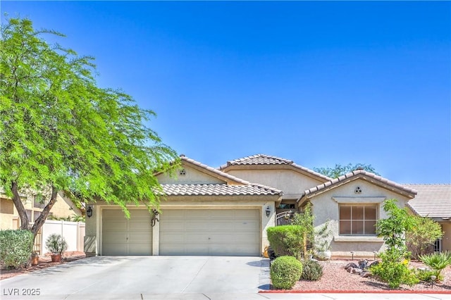3032 Prairie Princess Ave, North Las Vegas, NV 89081 - view of front facade with a garage, concrete driveway, stucco siding, and a tiled roof
