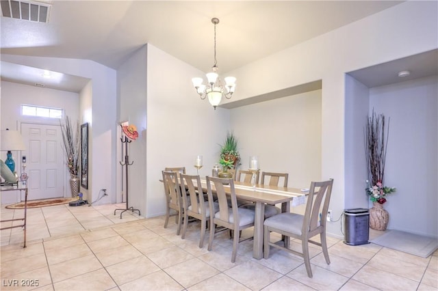3032 Prairie Princess Ave, North Las Vegas, NV 89081 - dining area featuring a chandelier, light tile patterned floors, and lofted ceiling