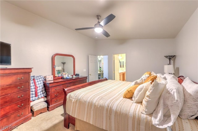 3032 Prairie Princess Ave, North Las Vegas, NV 89081 - bedroom with light colored carpet, vaulted ceiling, a ceiling fan, and connected bathroom