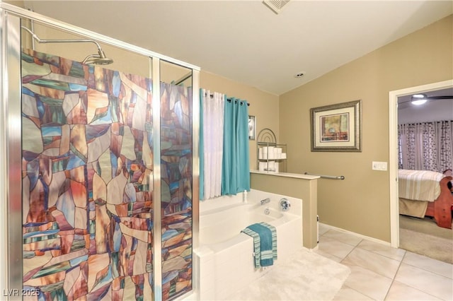 3032 Prairie Princess Ave, North Las Vegas, NV 89081 - ensuite bathroom with lofted ceiling, a bath, a stall shower, and tile patterned flooring