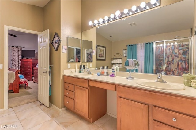 3032 Prairie Princess Ave, North Las Vegas, NV 89081 - ensuite bathroom featuring double vanity and tile patterned floors