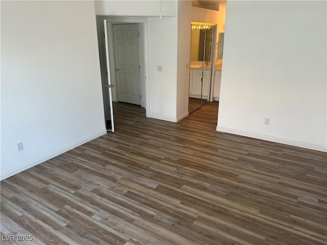 5201 S Torrey Pines Dr Unit 1184, Las Vegas, NV 89118 - unfurnished room featuring dark wood-style flooring and baseboards