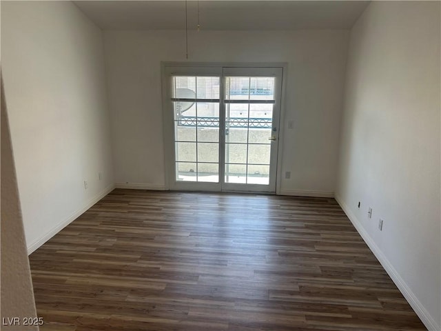 5201 S Torrey Pines Dr Unit 1184, Las Vegas, NV 89118 - spare room with dark wood finished floors and baseboards