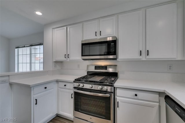 5201 S Torrey Pines Dr Unit 1184, Las Vegas, NV 89118 - kitchen featuring appliances with stainless steel finishes, white cabinets, light countertops, and recessed lighting