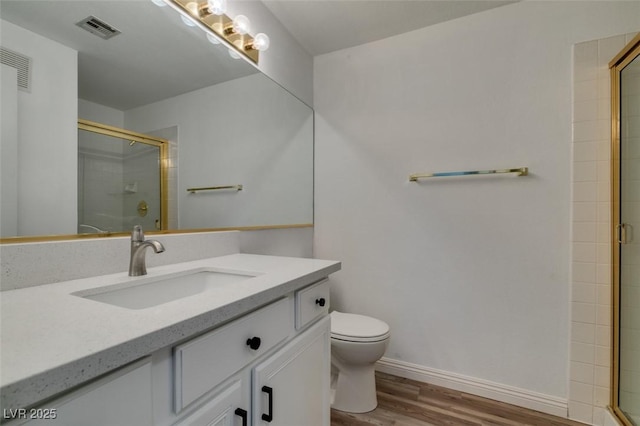 5201 S Torrey Pines Dr Unit 1184, Las Vegas, NV 89118 - bathroom with wood finished floors, a tile shower, and vanity