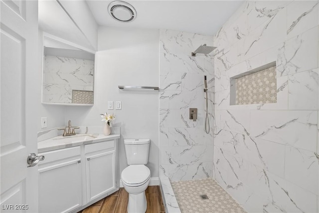 3616 Chevy Chase Ave, Las Vegas, NV 89110 - full bath with vanity, a marble finish shower, and wood finished floors