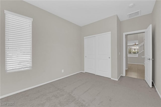 8969 Rice Peak St, Las Vegas, NV 89148 - unfurnished bedroom featuring carpet and a closet
