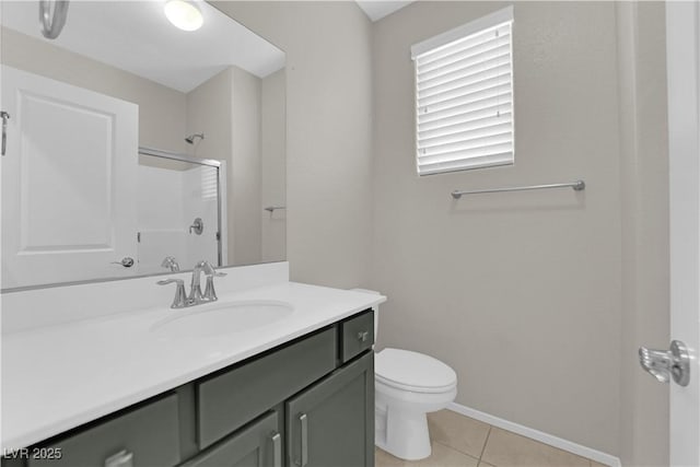 8969 Rice Peak St, Las Vegas, NV 89148 - bathroom featuring a shower, vanity, and tile patterned floors