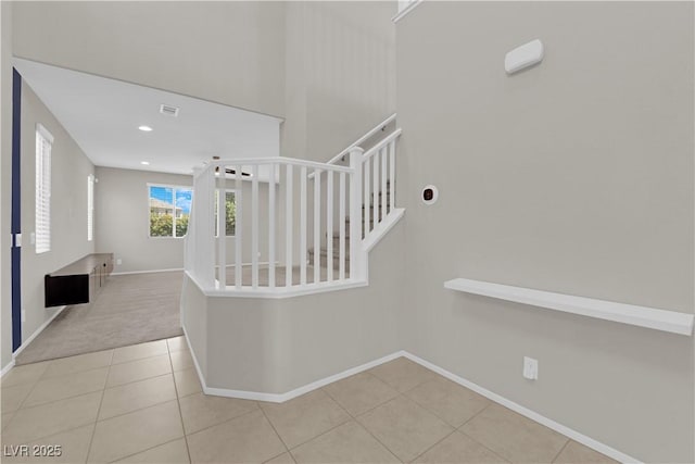 8969 Rice Peak St, Las Vegas, NV 89148 - stairs with tile patterned flooring, carpet floors, and recessed lighting