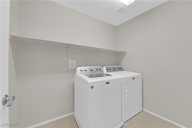 8969 Rice Peak St, Las Vegas, NV 89148 - laundry room featuring washing machine and clothes dryer and baseboards