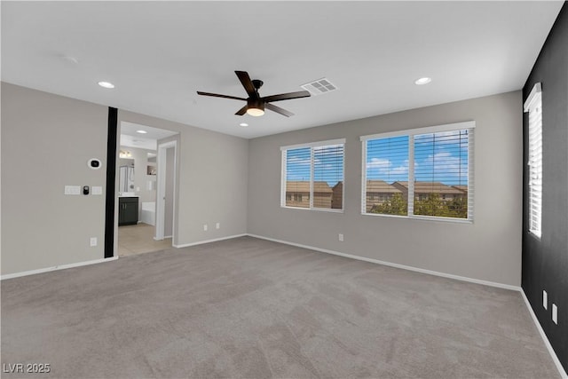 8969 Rice Peak St, Las Vegas, NV 89148 - unfurnished bedroom featuring light colored carpet, recessed lighting, a ceiling fan, and ensuite bath