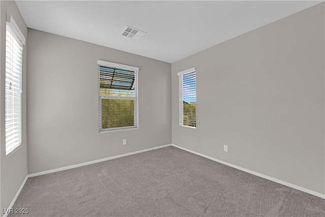 8969 Rice Peak St, Las Vegas, NV 89148 - carpeted spare room featuring baseboards