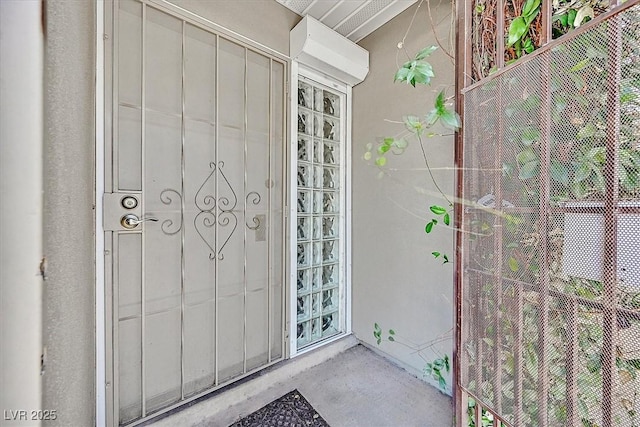 216 Lorenzi St, Las Vegas, NV 89107 - property entrance featuring stucco siding