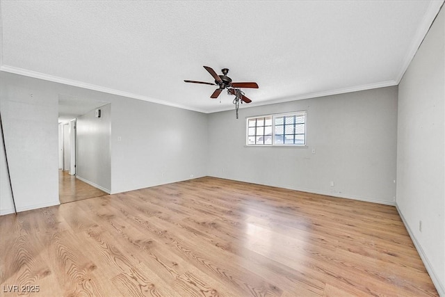 216 Lorenzi St, Las Vegas, NV 89107 - spare room with a ceiling fan, crown molding, and light wood-type flooring