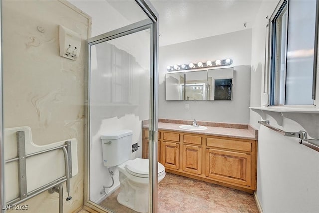 216 Lorenzi St, Las Vegas, NV 89107 - bathroom featuring vanity and a shower with shower door