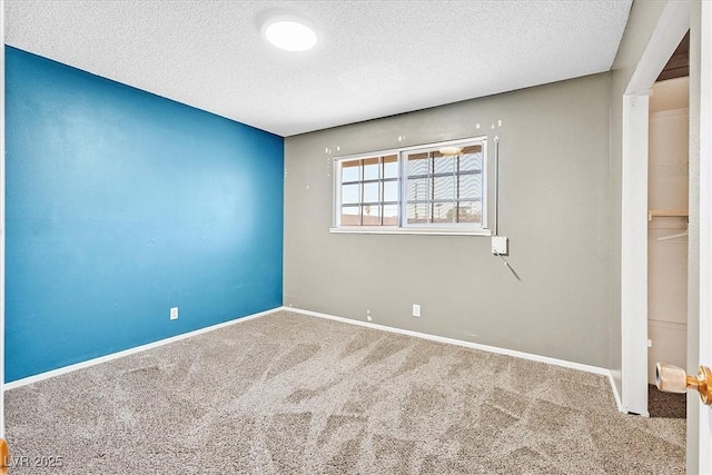 216 Lorenzi St, Las Vegas, NV 89107 - unfurnished bedroom with carpet flooring and a textured ceiling